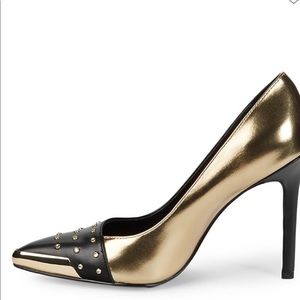 Crystal-studded pumps with metallic toe rand. 
Point toes
